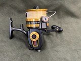 Vintage Penn U.S.A. 850SS Spinfisher Skirted Spool Reel w/ Box, Papers, and Lube  - 3 of 13
