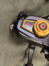 Vintage Penn U.S.A. 850SS Spinfisher Skirted Spool Reel w/ Box, Papers, and Lube  - 5 of 13