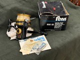 Vintage Penn U.S.A. 850SS Spinfisher Skirted Spool Reel w/ Box, Papers, and Lube  - 1 of 13
