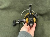Vintage Penn U.S.A. 850SS Spinfisher Skirted Spool Reel w/ Box, Papers, and Lube  - 9 of 13