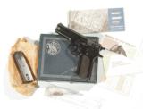 S&W MODEL 147A
AUTOMATIC PISTOL WITH IT'S ORIGINAL BOX - 1 of 9