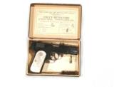 COLT MODEL 1908 HAMMERLESS IN .380 CALIBER WITH FACTORY PEARL GRIPS IN THE BOX - 1 of 12