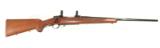 RUGER MODEL 77 BOLT ACTION RIFLE IN .338 WINCHESTER MAGNUM. {1977 MFG.} - 1 of 6