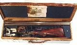 BRITISH 10 BORE DOUBLE HAMMER SHOTGUN BY "WILLIAMS & POWELL" IN IT'S ORIGINAL CASE WITH ACCESSORIES - 1 of 13