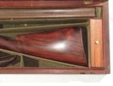 12 BORE PERCUSSION DOUBLE SHOTGUN.
BY KAVANAGH IN ITS
ORIGINAlL BOX - 4 of 14