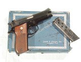 SMITH & WESSON
MODEL 39 PISTOL WITH IT'S ORIGINAL FACTORY BOX. - 1 of 10