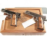 KIMBER 25th ANNIVERSARY 1911 PISTOL SET( GOLD MATCH & CUSTOM) .45 a.c.p.
IN THEIR WOODEN PRESENTATION BOX - 10 of 13