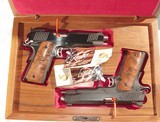 KIMBER 25th ANNIVERSARY 1911 PISTOL SET( GOLD MATCH & CUSTOM) .45 a.c.p.
IN THEIR WOODEN PRESENTATION BOX - 1 of 13