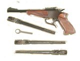 THOMPSON CENTER PISTOL WITH 4 BARRELS..30-30 WIN, 22 RIMFIRE, 5mm, .22 W.R.M - 1 of 4