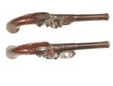 PAIR OF SILVER MOUNTED QUEEN ANNE FLINTLOCK PISTOLS BY 
