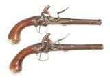 PAIR OF SILVER MOUNTED QUEEN ANNE FLINTLOCK PISTOLS BY 
