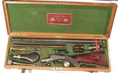 FABULOUS ALEXANDER HENRY HAMMERLESS DOUBLE RIFLE IN .500 EXPRESS IN IT'S ORIGINAL CASE COMPLETE WITH ACCESSORIES