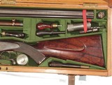FABULOUS ALEXANDER HENRY HAMMERLESS DOUBLE RIFLE IN .500 EXPRESS IN IT'S ORIGINAL CASE COMPLETE WITH ACCESSORIES - Image 9 of 15