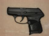RUGER LCP .380 with Pachmayr grips - 1 of 4