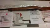 ruger 10/22 with hardwood stock new in the box - 1 of 4