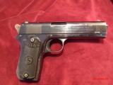 Colt model 1903 Pocket Hammer pistol. - 1 of 9