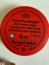 Flobert ball breech caps