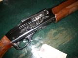 Remington 1100 12ga. modified choke barrel. - 2 of 5