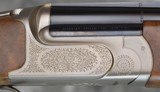 Perazzi High Tech Lusso Nickel Sporting 12GA 32" (547) - 1 of 5
