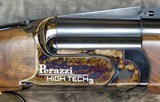 Perazzi High Tech Gold 3 Position Adjustable Rib Skeet Combo 12GA 30"/30" (588) - 1 of 7