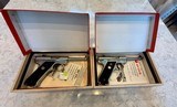 Sequential Set of Ruger 1 of 5000 22 Cal Handguns. Unfired with org boxes