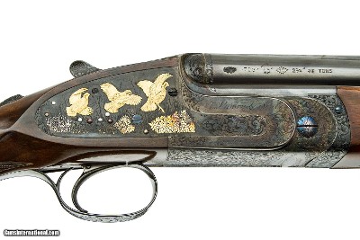PURDEY EXTRA FINISH O/U
KEN HUNT ENGRAVED 12 GAUGE