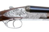 HOLLAND & HOLLAND - ROYAL
SXS 12 GAUGE WITH 2 EXTRA SETS OF BARRELS - 1 of 17