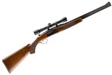 FRANCOTTE (RUGER)
OVER UNDER DOUBLE RIFLE 9.3X74R WITH EXTRA 20 GAUGE BARRELS - 3 of 13
