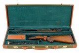 FRANCOTTE (RUGER)
OVER UNDER DOUBLE RIFLE 9.3X74R WITH EXTRA 20 GAUGE BARRELS - 13 of 13
