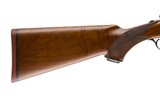 FRANCOTTE (RUGER)
OVER UNDER DOUBLE RIFLE 9.3X74R WITH EXTRA 20 GAUGE BARRELS - 11 of 13