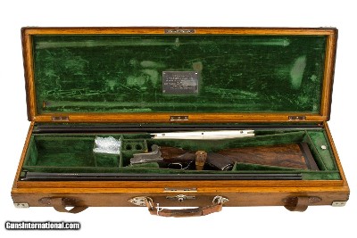 R.G.OWEN CUSTOM OVER UNDER 12 GAUGE WITH AN EXTRA SET OF BARRELS