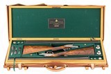 HOLLAND & HOLLAND MODEL DE LUXE PAIR 20 GAUGE AND 410 GRIFNEE ENGRAVED - TOM SELLECK COLLECTION - 1 of 17
