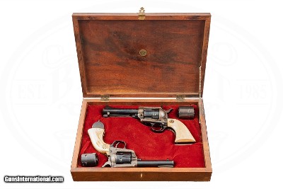 COLT NEW FRONTIER 22 LR WITH 22 MAG CYLINDER AND 2ND GEN NEW FRONTIER 45 LONG COLT WITH 45 ACP CYLINDER - CASED SET - COLT IVORY GRIPS