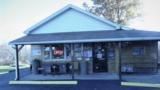 NE Ohio Full Service home based Gun Shop, Separate retail store building 800 SF, Alarmed,heated, cooled.1400 SF Ranch home. - 1 of 12