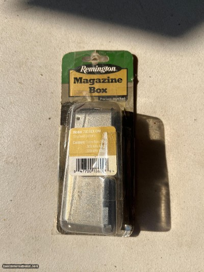 Remington 700 BDL removable box magazine, large action. Blue with deer head and scroll engraved.