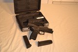 Sig Sauer P250+
(17 + 1 Rds Mags) - 5 of 7