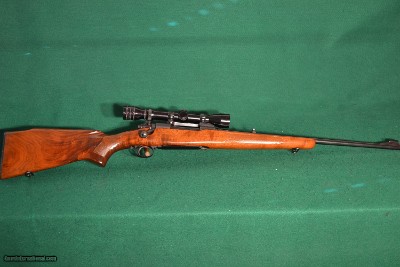 Winchester "Featherweight" M-70 (.270) w/Redfield Scope)