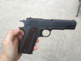 Colt 1911a1.
Made by Ithaca - 2 of 4