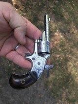 Factory engraved Colt - 1 of 4