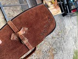 Leather gun case.
Dylan carved on side