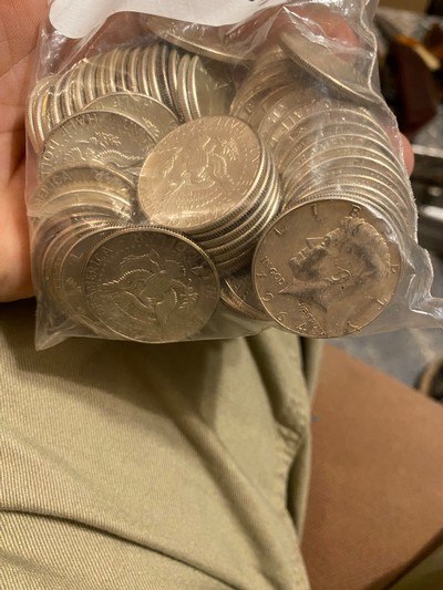 61.
Very nice pre-64 Silver half dollars.