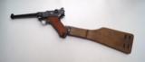 1908 DWM
MILITARY GERMAN LUGER WITH MATCHING NUMBEREDE MAGAZINE & WOODEN STOCK - 1 of 8