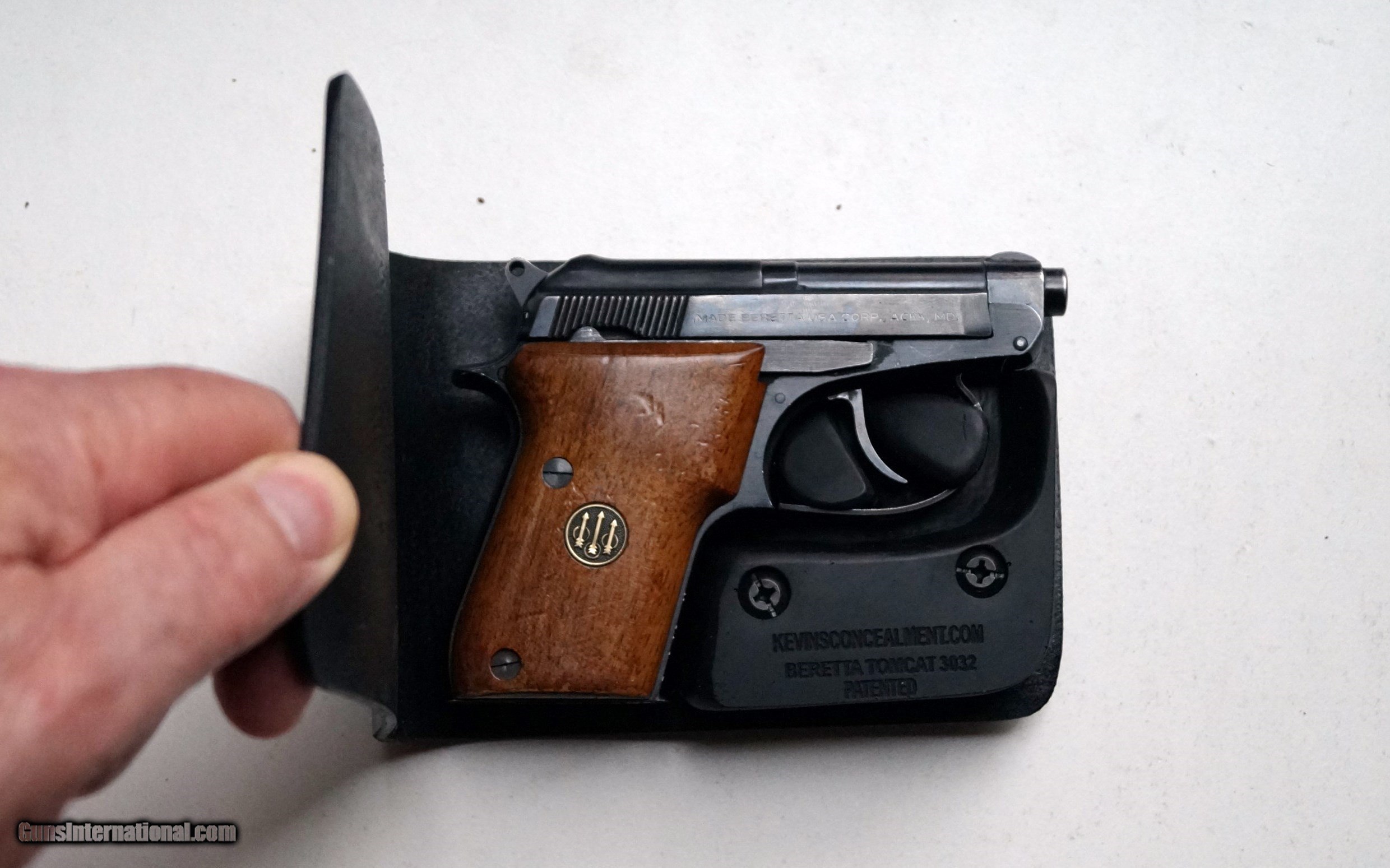 BERETTA MODEL 21 A WITH CONCEALED WALLET HOLSTER
