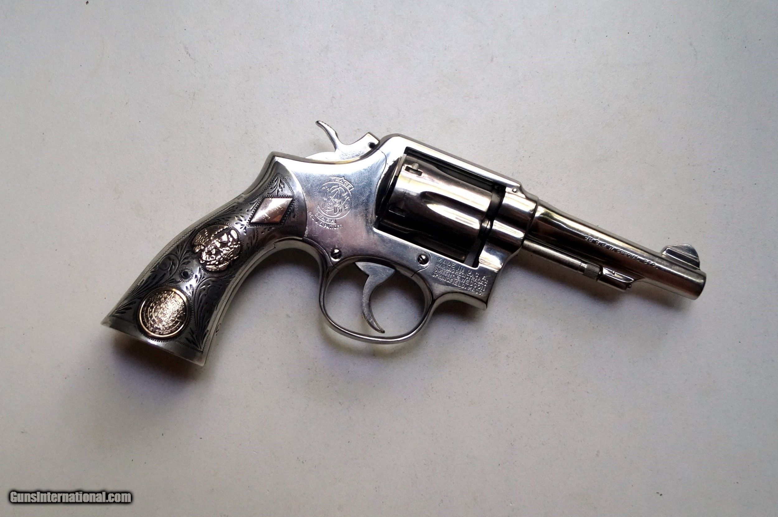 SMITH AND WESSON MODEL 10 WITH SILVER HAND MADE GRIPS - BEAUTIFUL