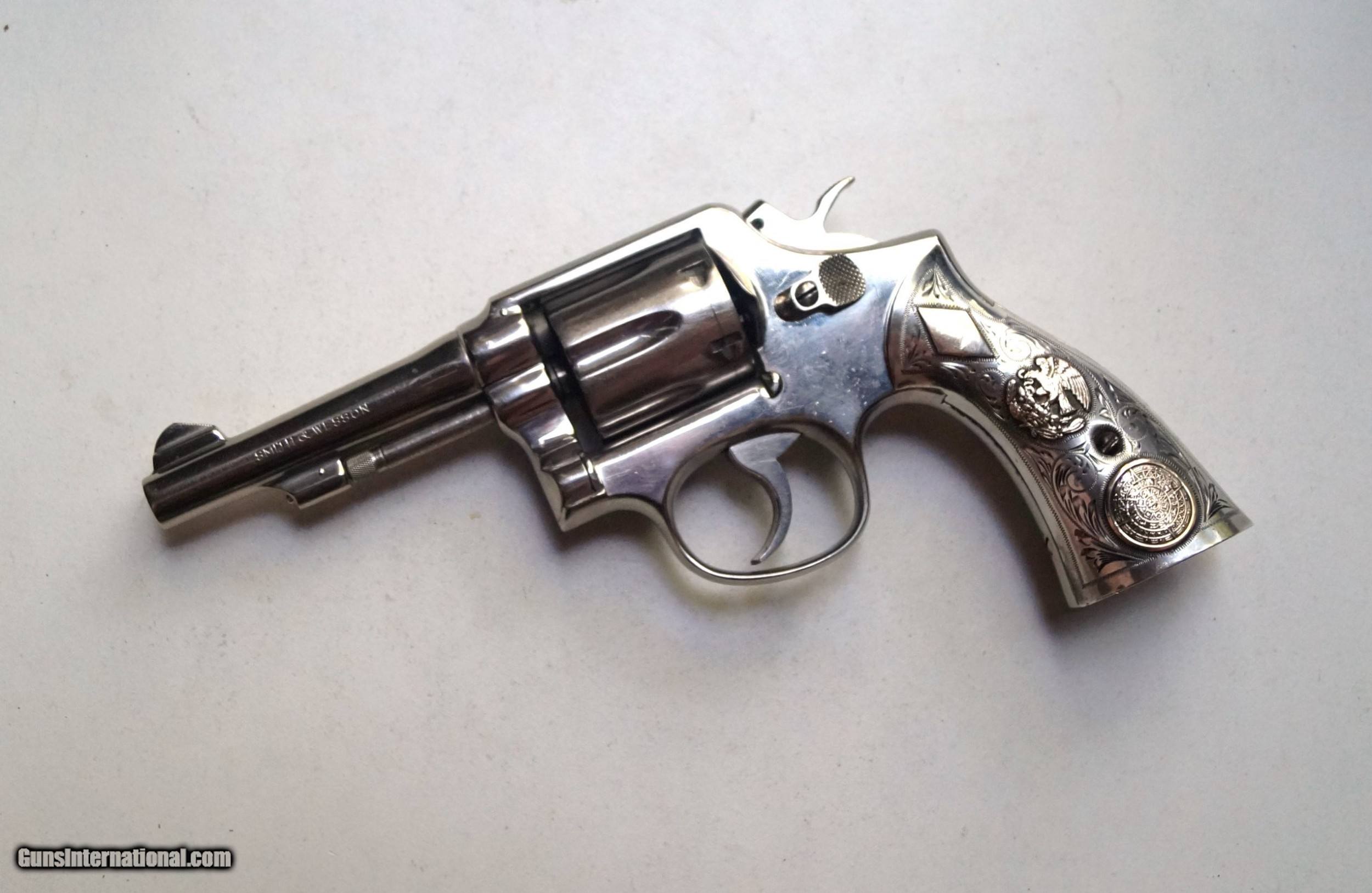 SMITH AND WESSON MODEL 10 WITH SILVER HAND MADE GRIPS - BEAUTIFUL