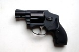SMITH & WESSON MODEL 442 - SNUB NOSE WITH CONCEALED CARRY
HOLSTER - 1 of 10