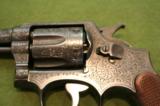 S&W Victory .38 Special highly engraved by H&H Zehner - 2 of 12