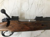 Winchester Model 70
Jim Bisio .375 H&H - 6 of 14