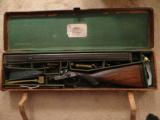 R. B. Rodda
.577 Snider Under Lever Cased Double Rifle - 1 of 11