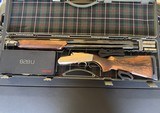 BENELLI MODEL 828U 12 GAUGE, 10X CHOKES, TWO STOCKS